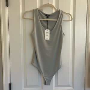 Light blue/grey body contour express body tank